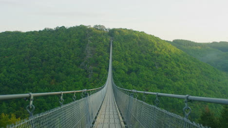 Geierlay-suspension-bridge-wide-shot-in-morning-on-summer-day-pov-1