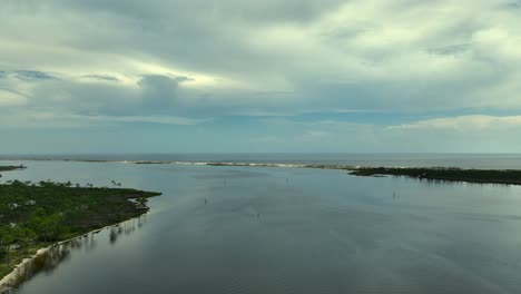 Aerial-reverse-reveal-of-Perdido-Key,-Florida-over-Big-Lagoon