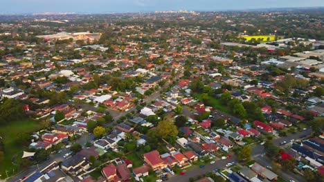 Drone-of-houses-and-horizon-in-Sydney,-Australia-8