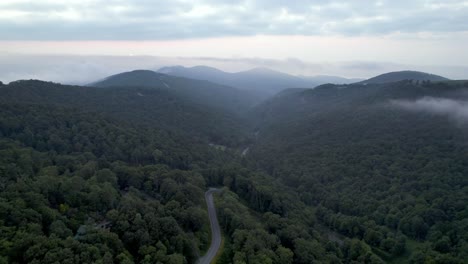 Aerial-morning-fog-across-the-blue-ridge-and-appalachian-mountains-near-boone-and-blowing-rock-nc,-north-carolina