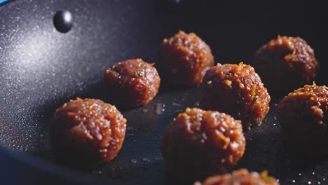 Cooking-Meatballs-Made-With-Lean-Ground-Turkey-Meat