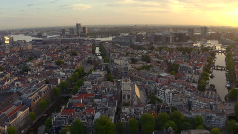 Circling-establishing-drone-shot-over-Old-church-building-in-central-Amsterdam