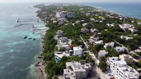 Beautiful-aerial-drone-tilt-up-a-shot-over-the-south-side-of-Isla-Mujeres-island-in-Quintana-Roo-Mexico-on-a-bright-sunny-day