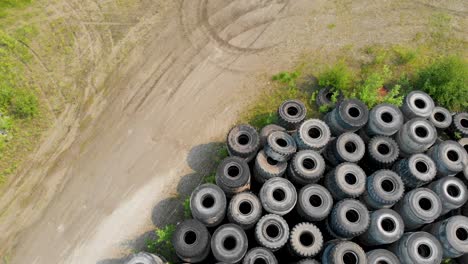 4K-Drone-Video-of-Discarded-Giant-Excavator-Tire-Pile-in-wilderness-near-Fairbanks,-AK-during-Summer-Day-7
