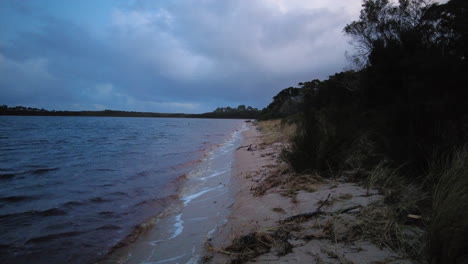 Early-moody-morning-around-the-lake-in-Strahan,-West-Coast-Tasmania