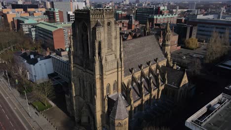 Aerial-drone-flight-around-the-rooftop-of-the-Holy-Name-Church-of-Jesus-Christ-on-Oxford-Road-in-Manchester-City