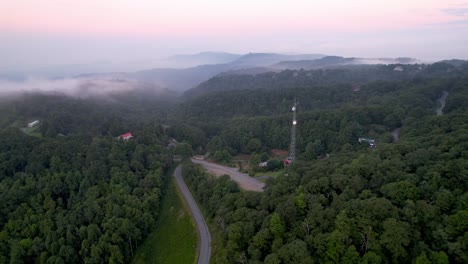 Aerial-orbit-of-communications-tower-with-microwave-dishes-near-boone-nc,-north-carolina