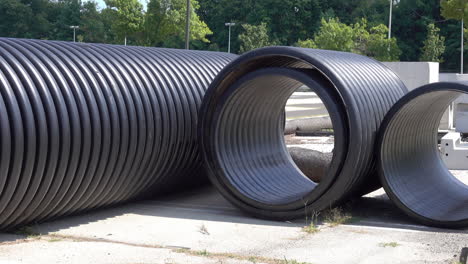 Large-corrugated-drain-pipes-sit-at-constructions-site