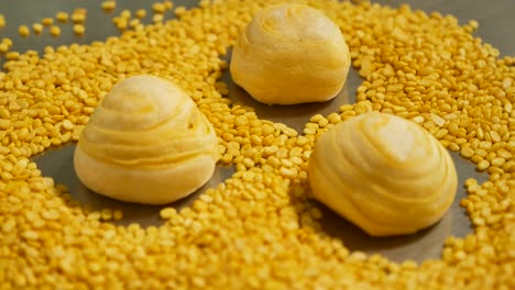 Yellow-Chinese-Pastry-and-Peel-Mung-Bean-on-Table,-Close-Up-1
