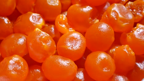 Many-of-Orange-Salted-Yolk,-Close-Up-3