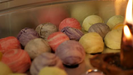 Colorful-Chinese-Pastry-Smoke-with-Aroma-Candle,-Close-Up-1