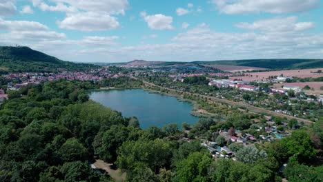 Big-blue-lake-in-sondershausen,-germany,-aerial-drone-shot