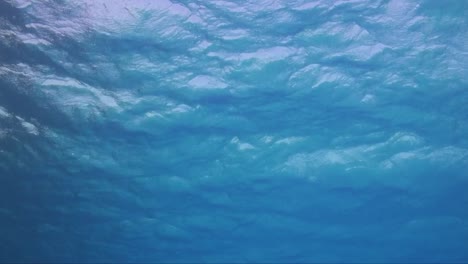 Ocean-surface-filmed-from-underwater-showing-soft-waves