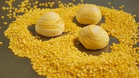 Yellow-Chinese-Pastry-and-Peel-Mung-Bean-on-Table,-Close-Up-2