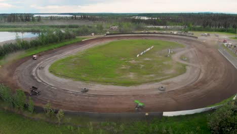 4K-Drone-Video-of-Sprint-Car-Racing-at-Mitchell-Raceway-in-Fairbanks,-AK-during-Sunny-Summer-Evening-1