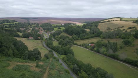 Approaching-Hutton-le-Hole-from-the-south-through-steep-wooded-valley