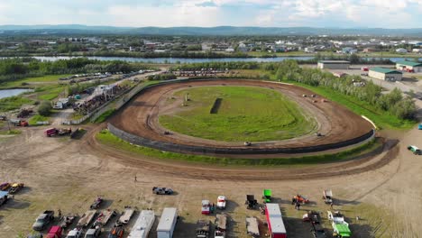 4K-Drone-Video-of-Modified-Stock-Car-Racing-at-Mitchell-Raceway-in-Fairbanks,-AK-during-Sunny-Summer-Evening-6