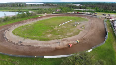 4K-Drone-Video-of-Stock-Car-Racing-at-Mitchell-Raceway-in-Fairbanks,-AK-during-Sunny-Summer-Evening-3