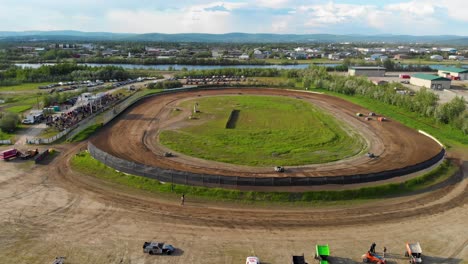 4K-Drone-Video-of-Modified-Stock-Car-Racing-at-Mitchell-Raceway-in-Fairbanks,-AK-during-Sunny-Summer-Evening-3