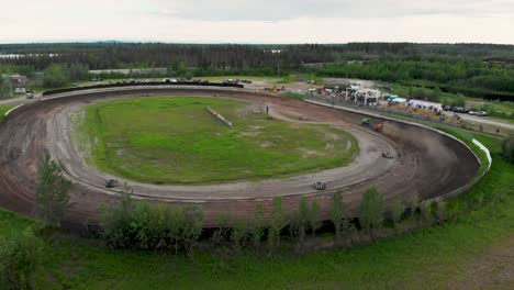 4K-Drone-Video-of-Sprint-Car-Racing-at-Mitchell-Raceway-in-Fairbanks,-AK-during-Sunny-Summer-Evening-3