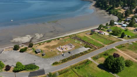 Drone-view-of-the-waterfront-Freeland-Park-during-low-tide-on-Whidbey-Island