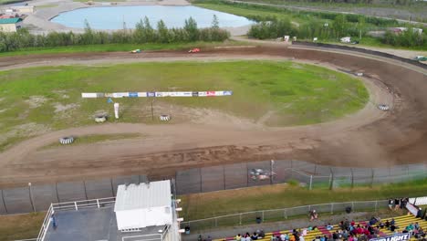 4K-Drone-Video-of-Stock-Car-Racing-at-Mitchell-Raceway-in-Fairbanks,-AK-during-Sunny-Summer-Evening-5