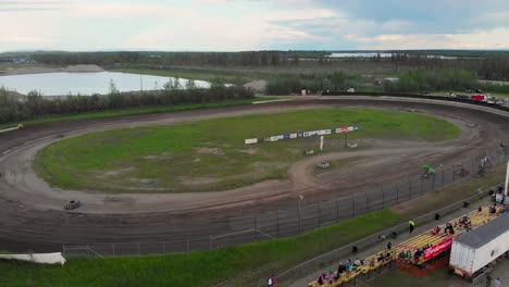 4K-Drone-Video-of-Sprint-Car-Racing-at-Mitchell-Raceway-in-Fairbanks,-AK-during-Sunny-Summer-Evening-12