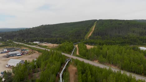 4K-Drone-Video-of-Trans-Alaska-Pipeline-crossing-under-Roadway-in-Fairbanks,-AK-during-Sunny-Summer-Day-3