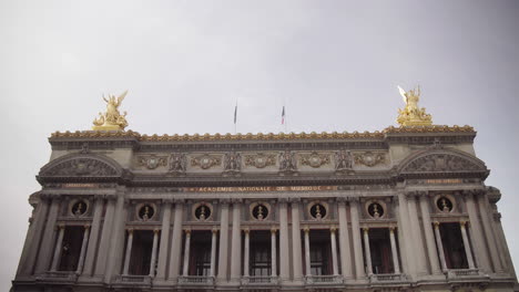 Close-up-Palais-Or-Opera-Garnier-The-National-Academy-Of-Music-Timelapse-In-Paris-4K-Daylight-Blue-Sky