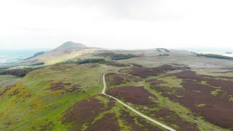 Lomond-Hills-highland-drone-panorama-with-winding-road,-Scotland