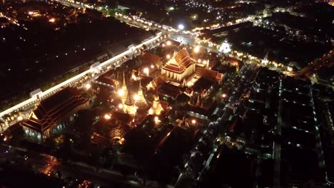 Night-drone-shots-of-Bangkok-near-Wat-Arun-temple,-UHD-2