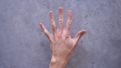 Hand-Fingers-Of-A-Man-Counting-Numbers-From-One-To-Five