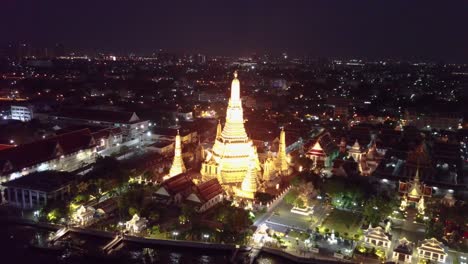 Night-drone-shots-of-Bangkok-near-Wat-Arun-temple,-UHD-7