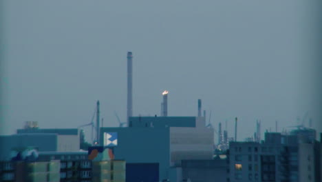 Shot-of-gas-flaming-from-a-tube-in-the-harbour-area