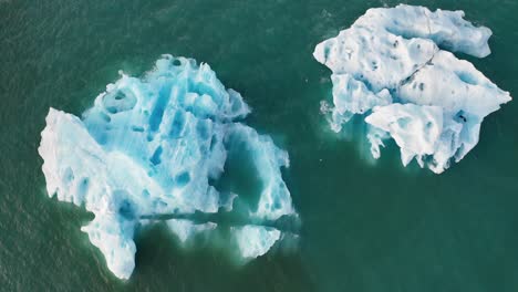 Overhead-stationary-shot-of-icebergs-floating-in-Jokulsarlon-glacier-lagoon-in-south-Iceland