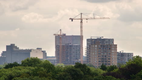 A-time-lapse-of-a-view-containing-some-buildings-and-a-crane
