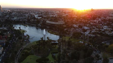 Aerial-view-overlooking-the-Echo-Park,-sunset-in-Los-Angeles,-USA---circling,-drone-shot