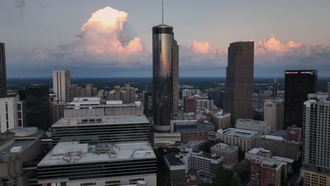 Aerial-view-of-sunset-reflection-off-high-rises-in-Atlanta,-Georgia