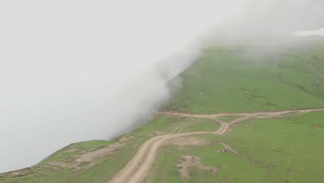 Aerial-Flying-Over-Misty-Baboon-Valley-Along-Empty-Path-In-Baboon-Valley-In-Kashmir