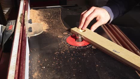 Luthier-Creating-Guitar-Fretboard-With-Woodworking-Machine,-Truck-Shot