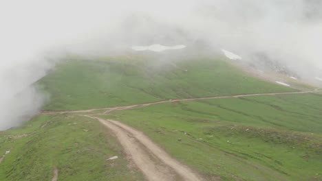 Aerial-View-Of-Misty-Baboon-Valley-Along-Empty-Path-In-Baboon-Valley-In-Kashmir