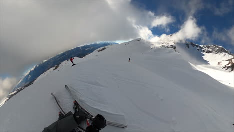 360-Gopro-view:-a-young-ski-freestyle-athlete-performs-a-backflip-on-swiss-ski-slopes-in-the-alps