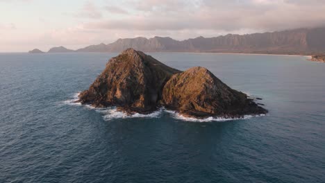 Moku-Nui-Islet-In-The-Pacific-Ocean-At-Sunset