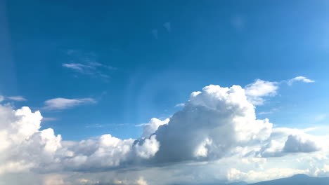 Shot-of-clouds-passing-at-a-high-speed-with-a-blue-sky-in-mexico