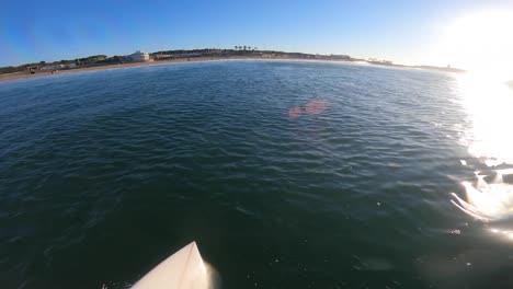POV-Surfing-on-Blue-Ocean-Wave-at-Sunrise