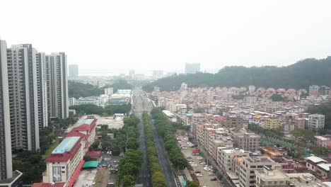 Drone-Shots-of-Guangzhou-outskirts-during-a-foggy,-hazy-morning,-China