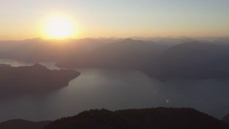 Amazing-Sunset-Aerial-Drone-Over-Deeks-Mountain-Rocky-Landscape-with-Trees-and-Howe-Sound-Fjord-in-Pacific-Ranges-Canada-BC-4K