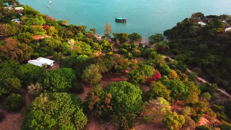 Coastal-Settlement-And-Tranquil-Kilifi-Creek-In-Kenya-With-Sight-Of-A-Hand-Built-Traditional-Wooden-Dhow