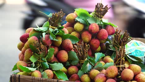 Fresh-Bunch-Of-Lychee-Fruits-For-Sale-In-The-Street-Of-Ho-Chi-Minh-City,-Saigon,-Vietnam