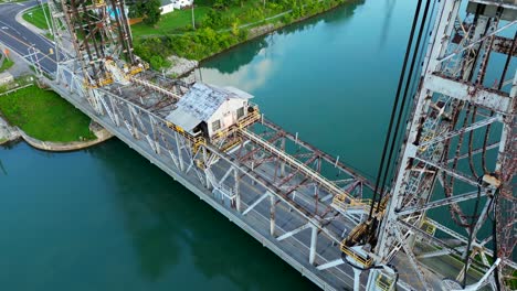 Car-drives-over-vertical-lift-bridge-on-Welland-Canal-in-Canada